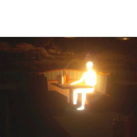 man on fire sitting on chair